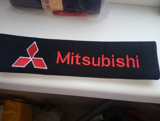 Накладки (чохли) на ремені безпеки Mitsubishi